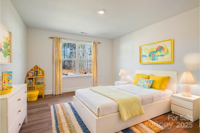 bedroom featuring dark wood-type flooring