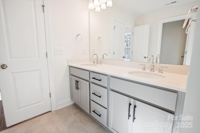 bathroom featuring vanity and tile patterned flooring