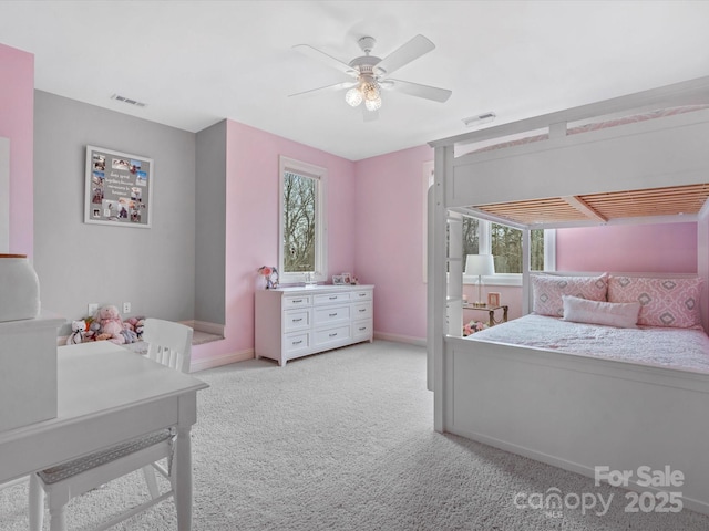 bedroom featuring ceiling fan and light carpet