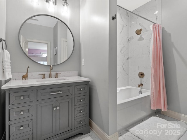 bathroom featuring vanity and shower / tub combo with curtain