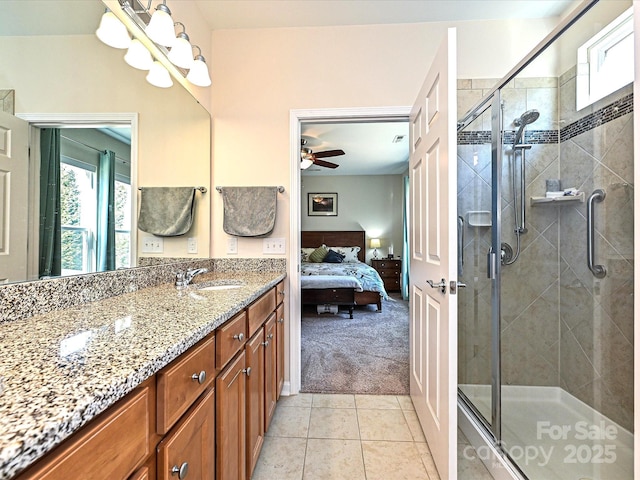 8024 Carolina Lakes Way, Fort Mill, SC 29707 - ensuite bathroom featuring vanity, plenty of natural light, ceiling fan, and a stall shower