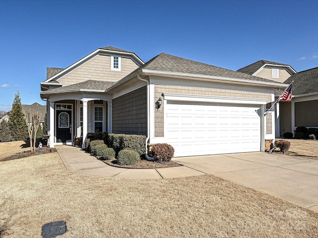 8024 Carolina Lakes Way, Fort Mill, SC 29707 - view of front facade with driveway, a garage, a porch, and roof with shingles