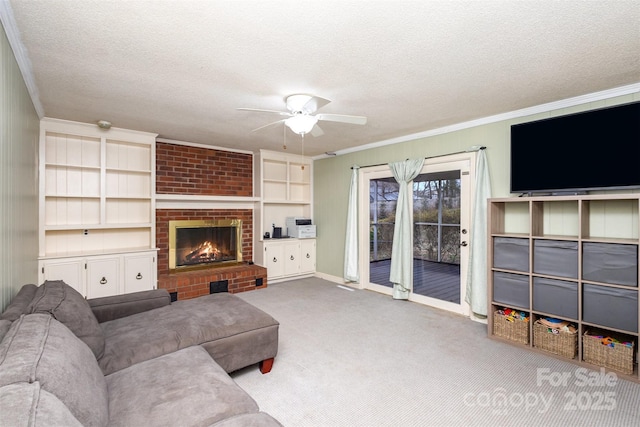 living room featuring crown molding, light carpet, a fireplace, and a textured ceiling