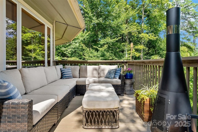 view of patio with a deck and an outdoor hangout area