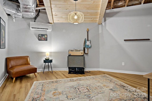 living area featuring wood ceiling, hardwood / wood-style floors, and an AC wall unit