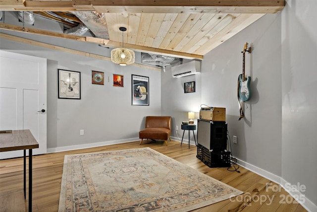 living area with wood ceiling, hardwood / wood-style flooring, lofted ceiling with beams, and a wall mounted AC