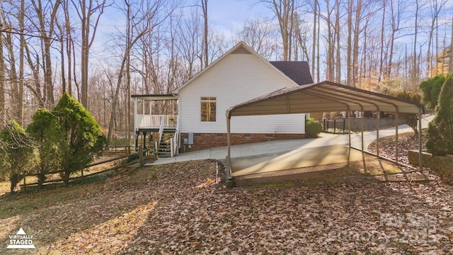 exterior space with a carport