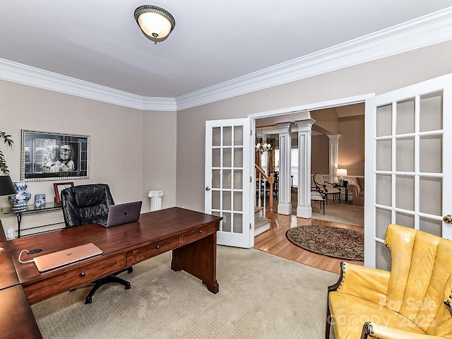 office with crown molding, decorative columns, french doors, and hardwood / wood-style flooring