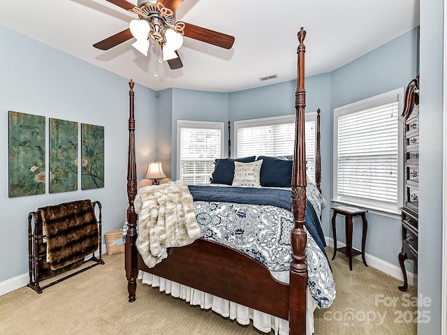 carpeted bedroom featuring ceiling fan