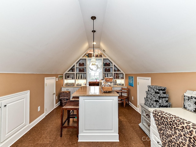 office area with lofted ceiling and built in features