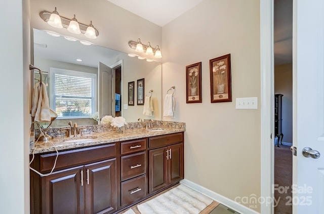 bathroom featuring vanity