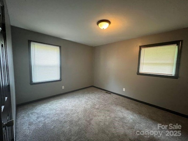 view of carpeted spare room