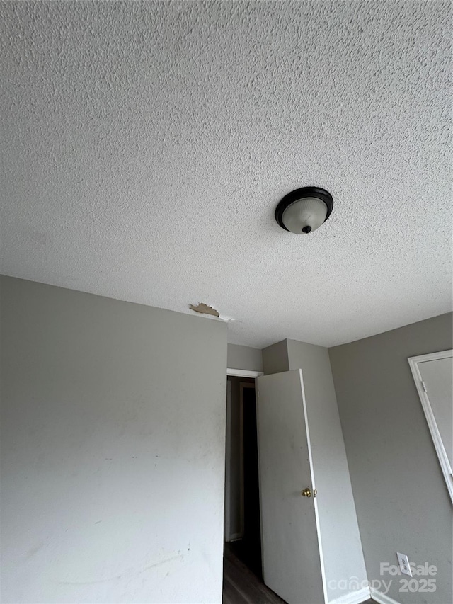 interior details with a textured ceiling