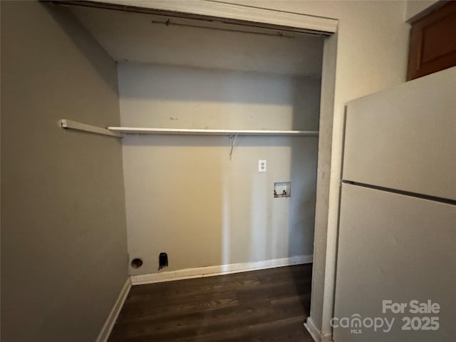 laundry area featuring washer hookup and dark hardwood / wood-style floors