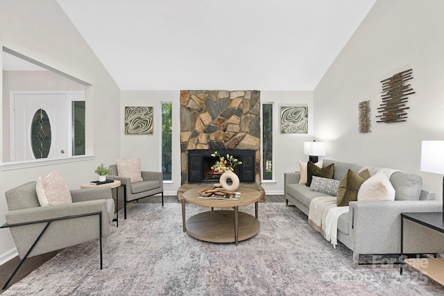 10912 Treebark Dr, Charlotte, NC 28226 - living room with lofted ceiling, wood finished floors, and a fireplace