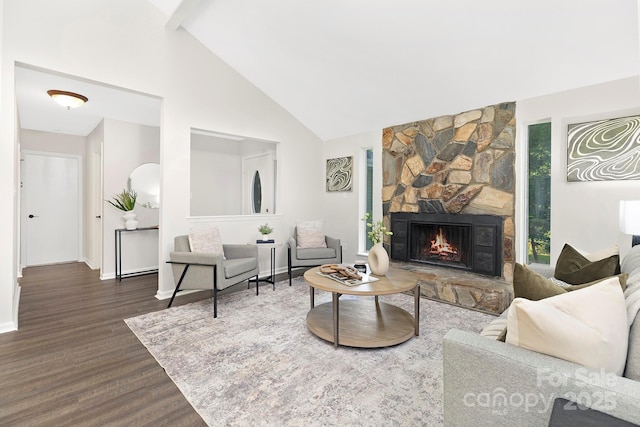 10912 Treebark Dr, Charlotte, NC 28226 - living room with wood finished floors, a stone fireplace, high vaulted ceiling, baseboards, and beamed ceiling