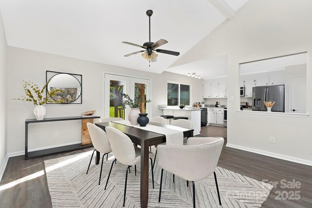 10912 Treebark Dr, Charlotte, NC 28226 - dining space featuring dark wood-style floors, french doors, baseboards, a ceiling fan, and high vaulted ceiling