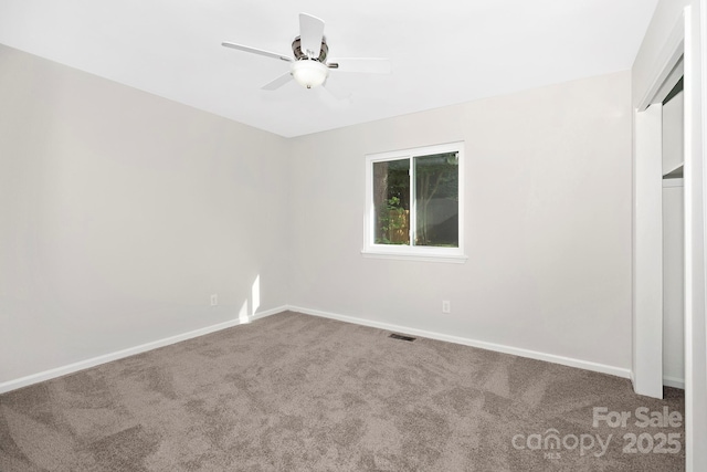 10912 Treebark Dr, Charlotte, NC 28226 - unfurnished bedroom with carpet flooring, baseboards, a closet, and a ceiling fan