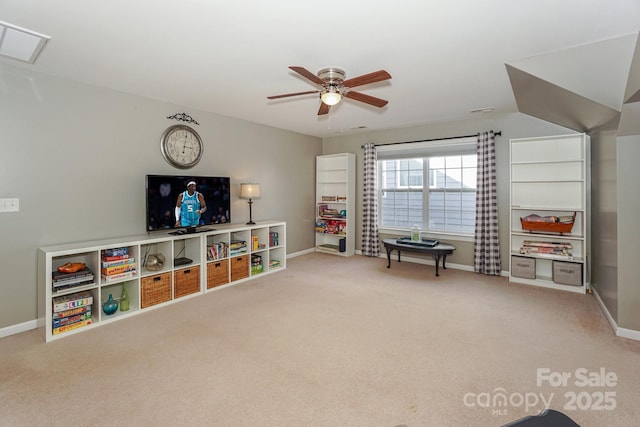 recreation room featuring light colored carpet and ceiling fan