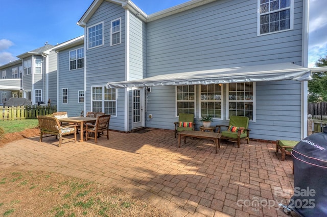 back of house featuring a patio area