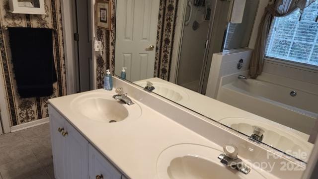 bathroom with plus walk in shower and vanity