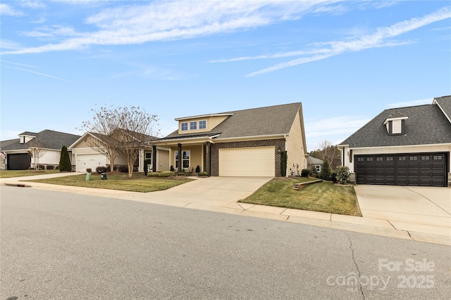 view of front facade featuring a garage and a front lawn