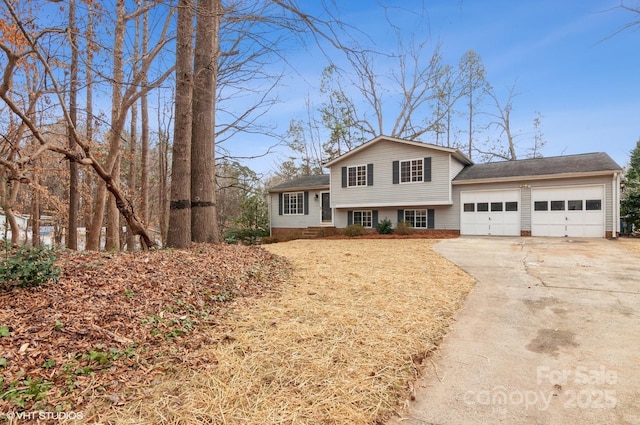 split level home featuring a garage