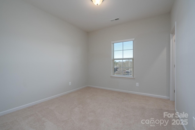 view of carpeted spare room