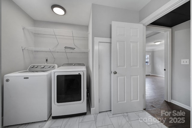 laundry room with washer and dryer