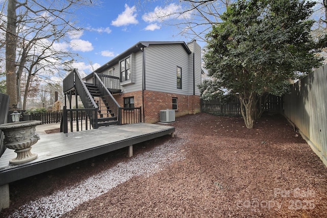 exterior space featuring a deck and central air condition unit