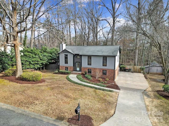 bi-level home with a front yard