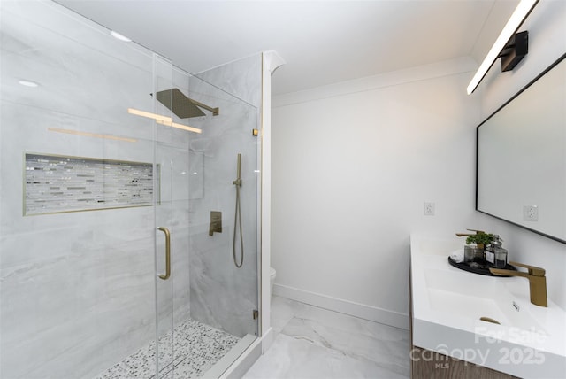 bathroom with vanity, toilet, walk in shower, and crown molding