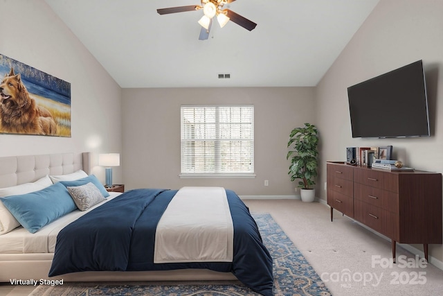 bedroom with lofted ceiling, light carpet, a ceiling fan, visible vents, and baseboards