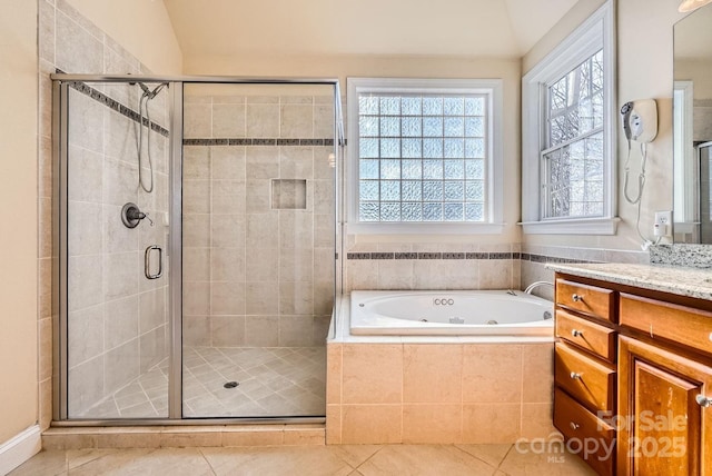 bathroom with separate shower and tub, tile patterned floors, lofted ceiling, and vanity