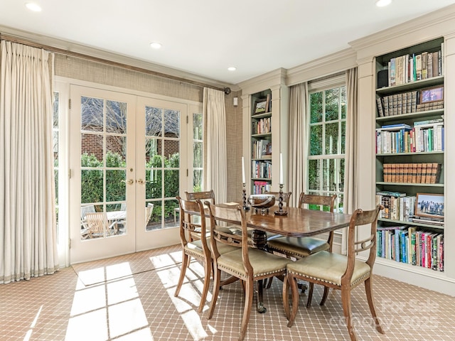 dining area with french doors and recessed lighting