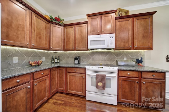 kitchen featuring crown molding, white appliances, stone counters, backsplash, and dark hardwood / wood-style floors