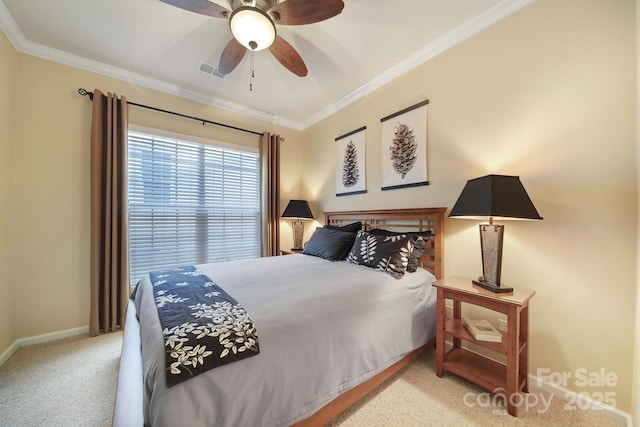 carpeted bedroom featuring crown molding and ceiling fan