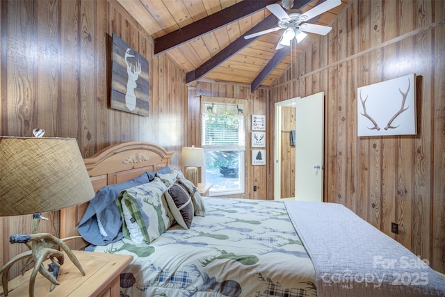 bedroom with wood walls, wooden ceiling, vaulted ceiling with beams, and ceiling fan