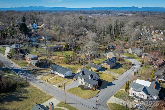 drone / aerial view featuring a mountain view