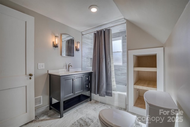 full bathroom featuring vanity, vaulted ceiling, shower / bath combo, and toilet