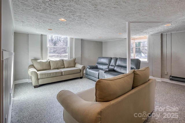 living room with carpet floors and a textured ceiling