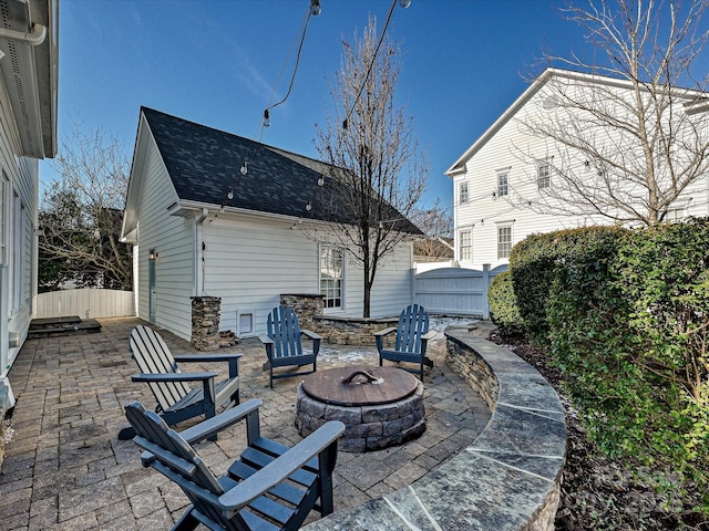 view of patio / terrace featuring a fire pit