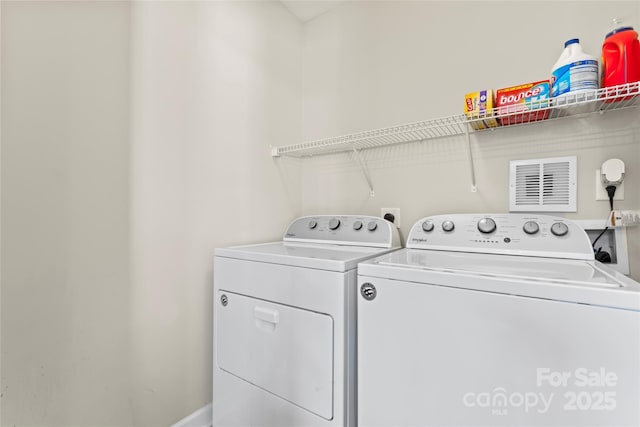 laundry area featuring washer and dryer