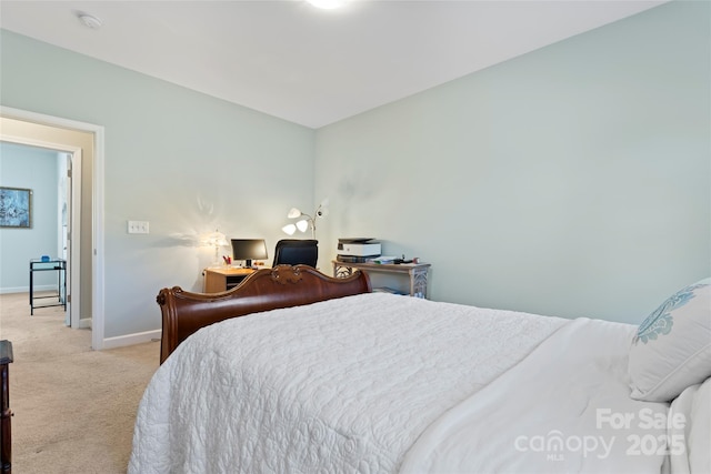 bedroom featuring light colored carpet