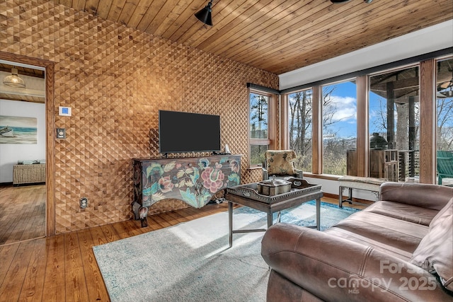 living room featuring hardwood / wood-style flooring, radiator heating unit, and wooden ceiling