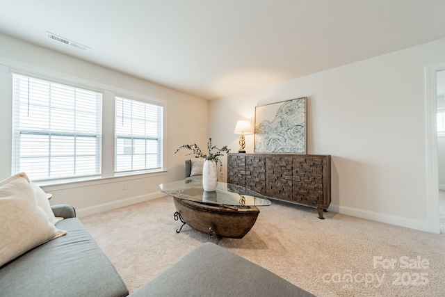 living room with light colored carpet