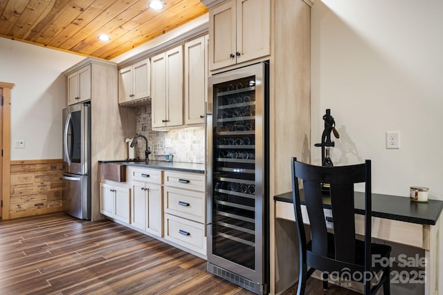 kitchen with stainless steel refrigerator, tasteful backsplash, wine cooler, dark hardwood / wood-style flooring, and wood ceiling