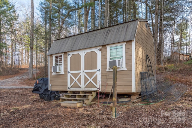 view of outbuilding featuring cooling unit