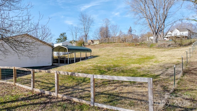 view of yard with a carport