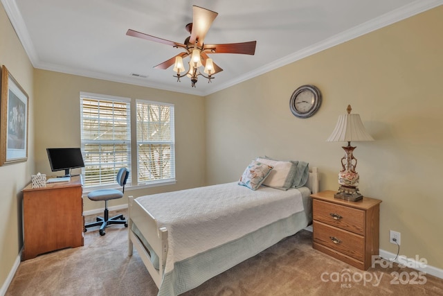 bedroom featuring baseboards, carpet flooring, and crown molding